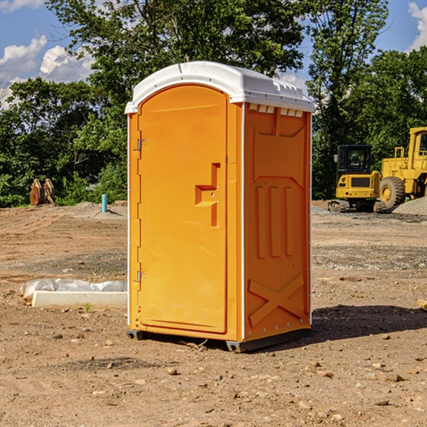 how often are the portable restrooms cleaned and serviced during a rental period in Denmark Minnesota